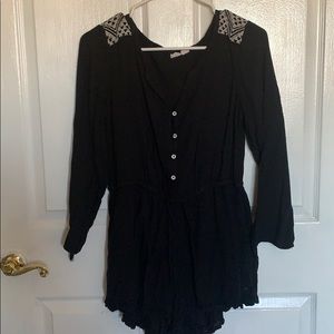 Foxy black romper with white detailing